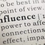 image is showing a peice of the dictionary page which is pointed to the word: Inflence-Collaborate with Influencers