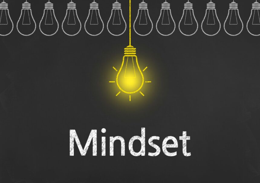 Master Your Mindset: How to Cultivate a Positive Attitude and Achieve Your Goals- image is showing a light bult which is ON compared to the other OFF bulbs .