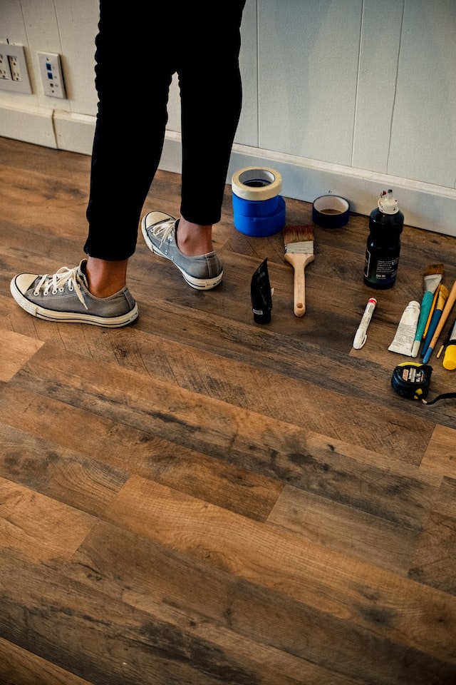 a person is standing beside some stuff related to home improvements